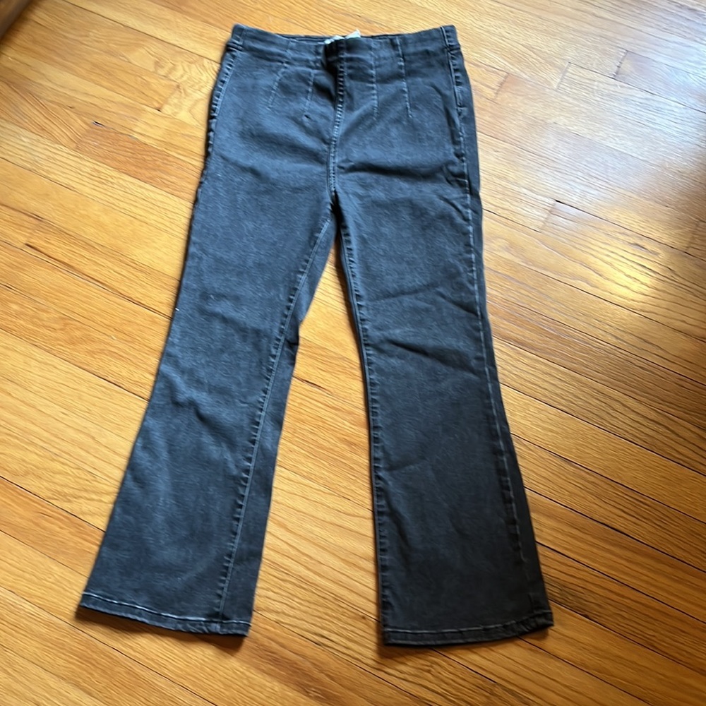 Free People black denim high waisted kick flare cropped jeans.